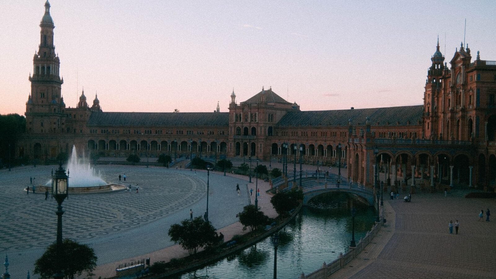 Plaza de Espana in Seville glowing in late-day summer light.