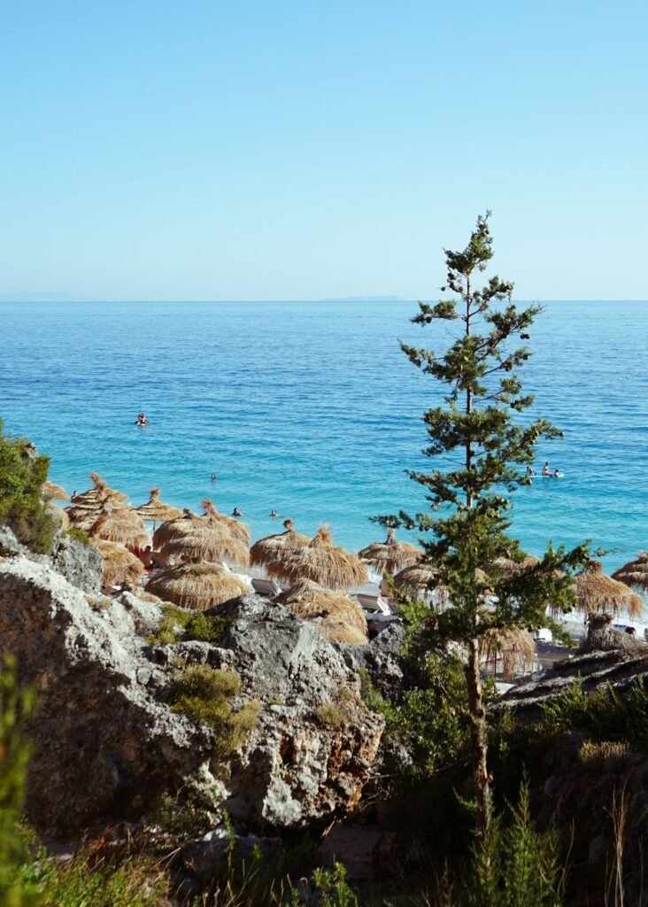 Beach and blue sea viewed from the coast at Dhërmi, Albania.