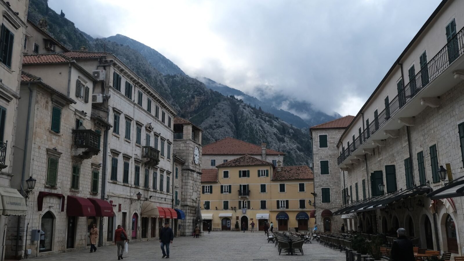 Stone buildings and an open square in Kotor Old Town, Montenegro.