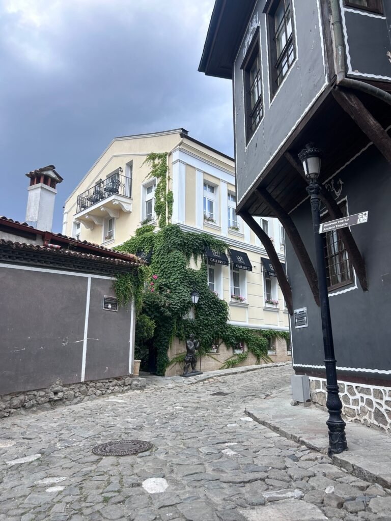 Cobbled historic street and traditional buildings in Plovdiv Old Town, Bulgaria.